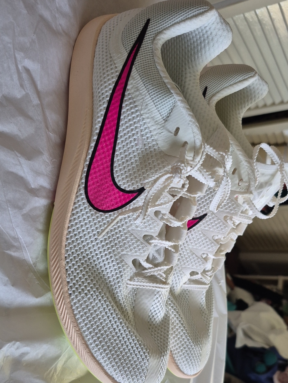 Nike White Athletic Shoes with Pink Swoosh